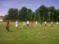 In fila, dietro l'Istruttore 